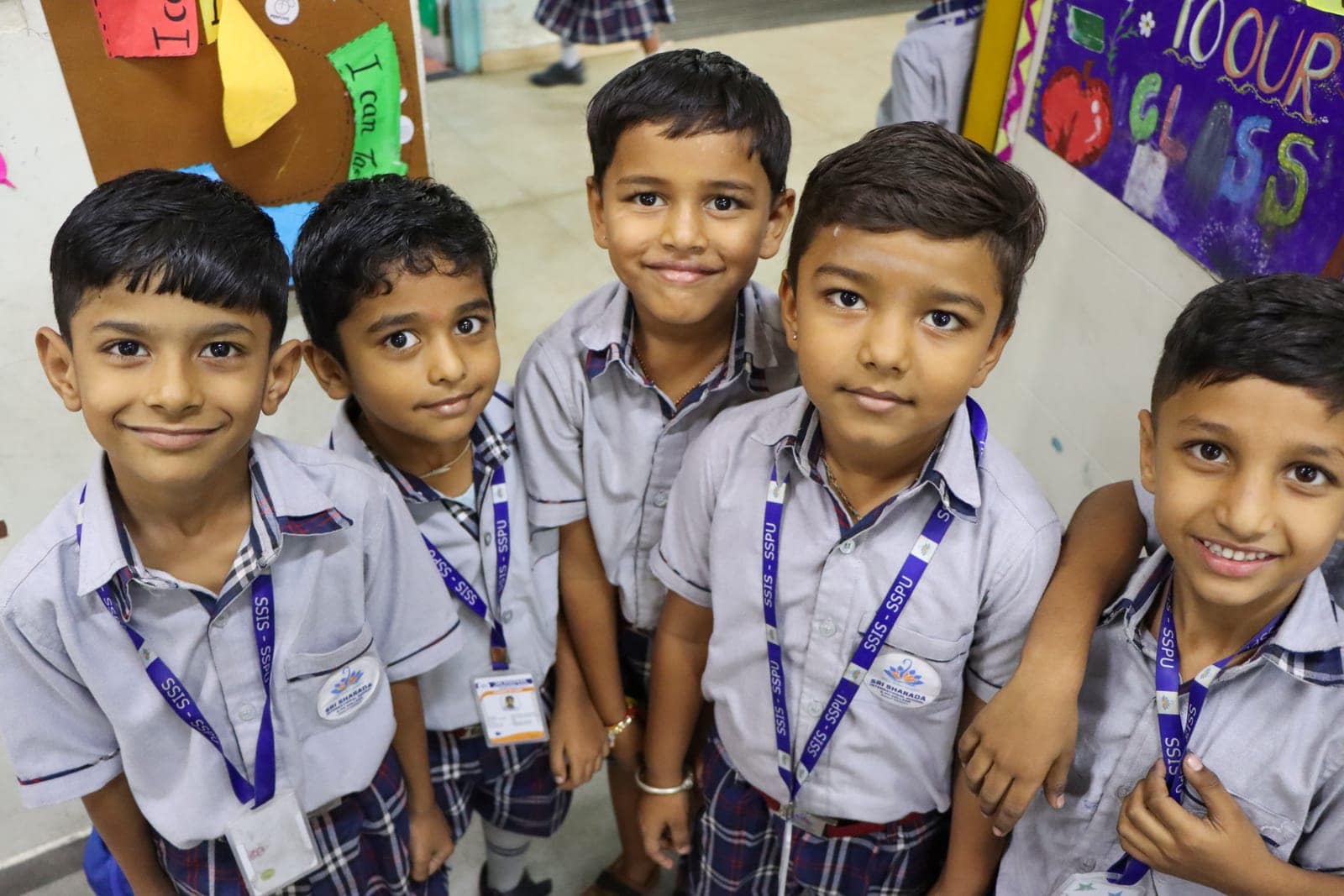 Gang of grins in a classroom at Sri Sharada International School