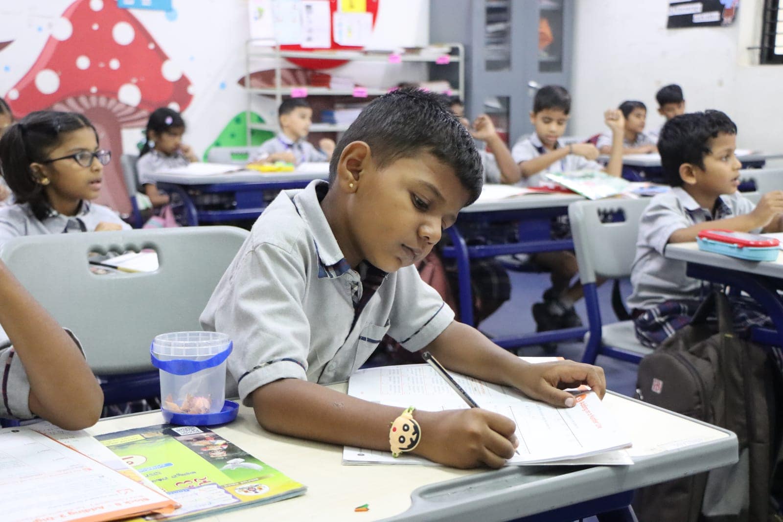 Pencil at work in a classroom at Sri Sharada International School