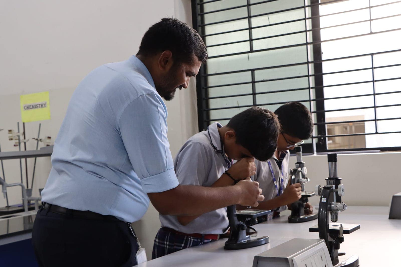 Students learning — Microscope study at Sri Sharada International School