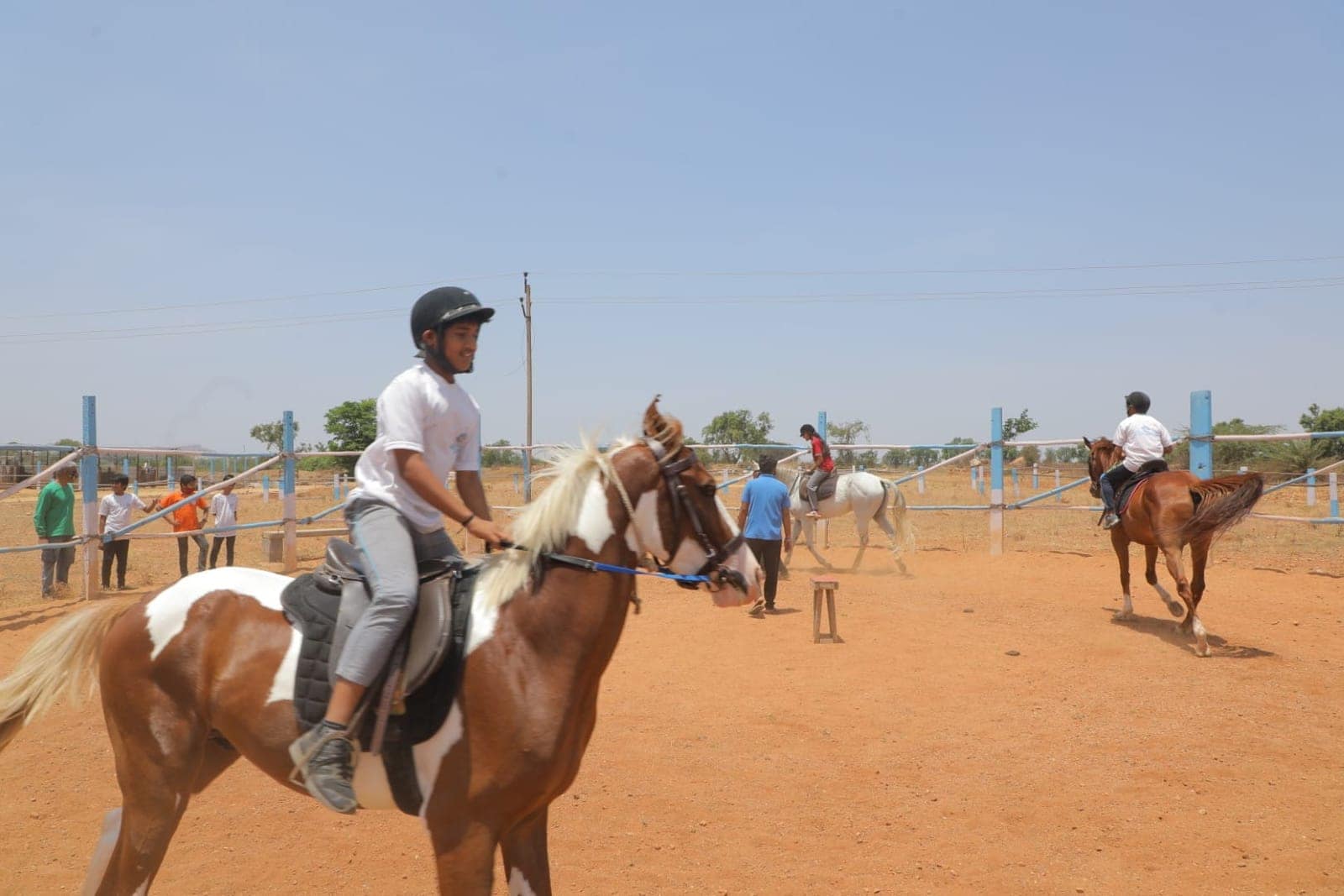 Students playing horse duo at Sri Sharada International School