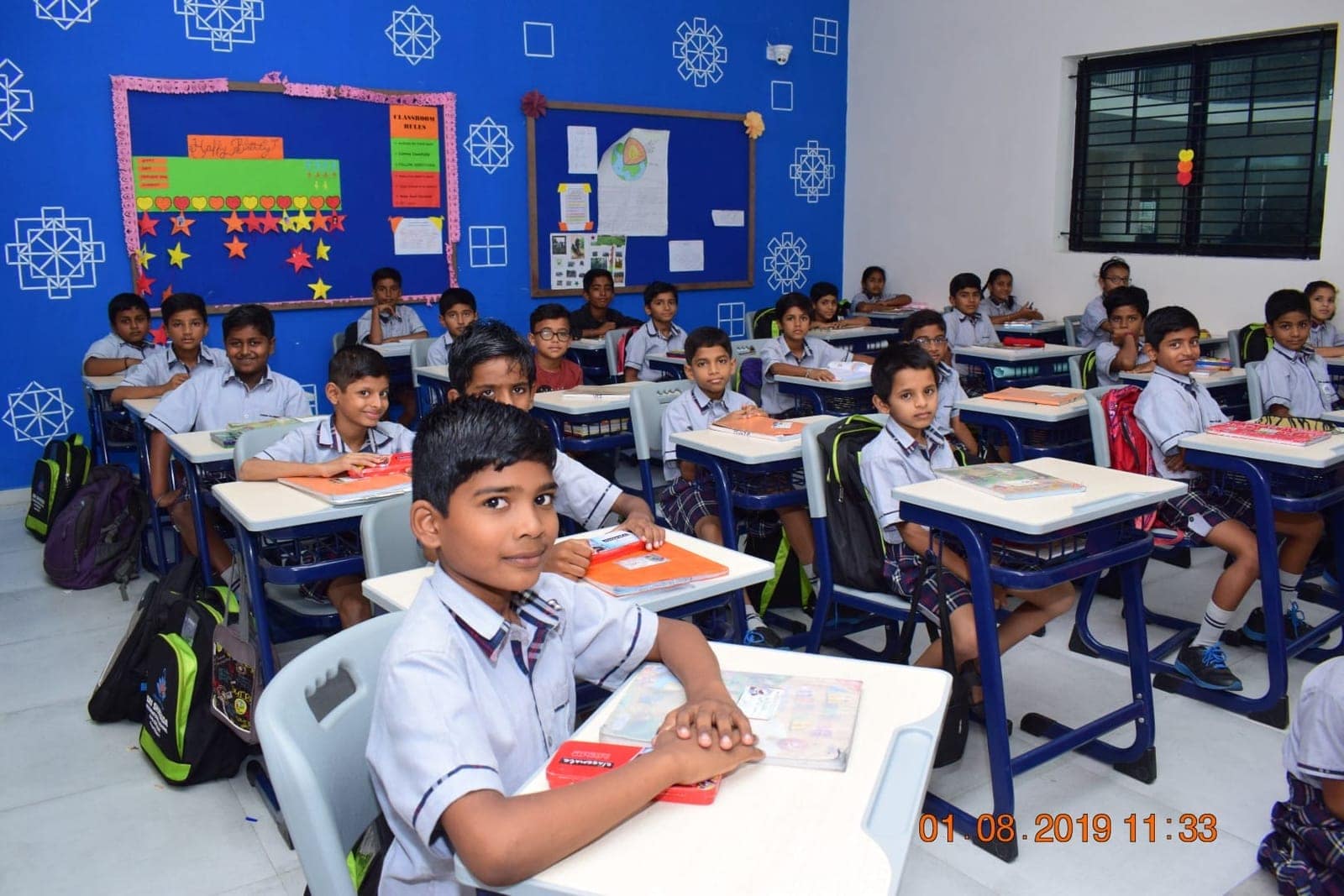 Folk dance performance on stage at Sri Sharada International School