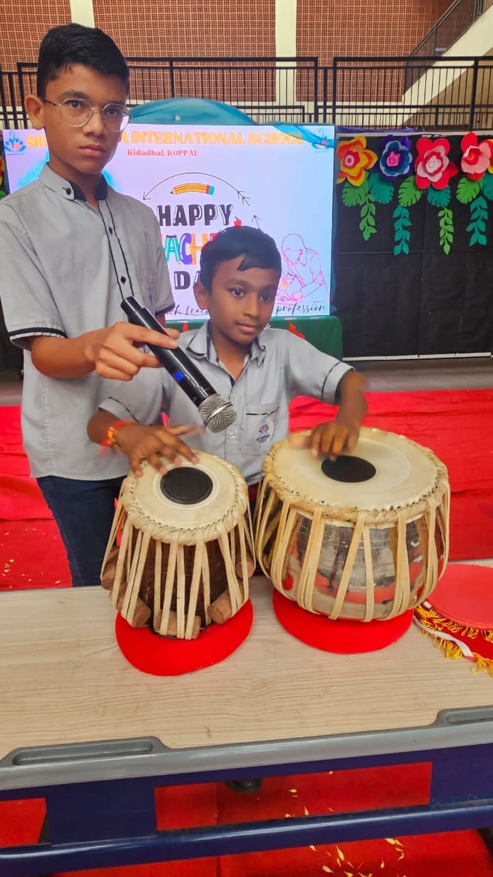 Students learning — Tabla music at Sri Sharada International School