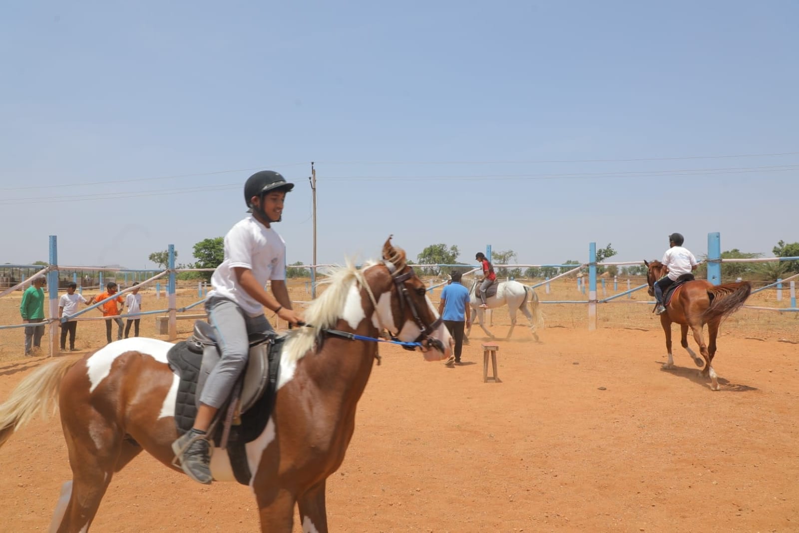 Students playing horse duo at Sri Sharada International School