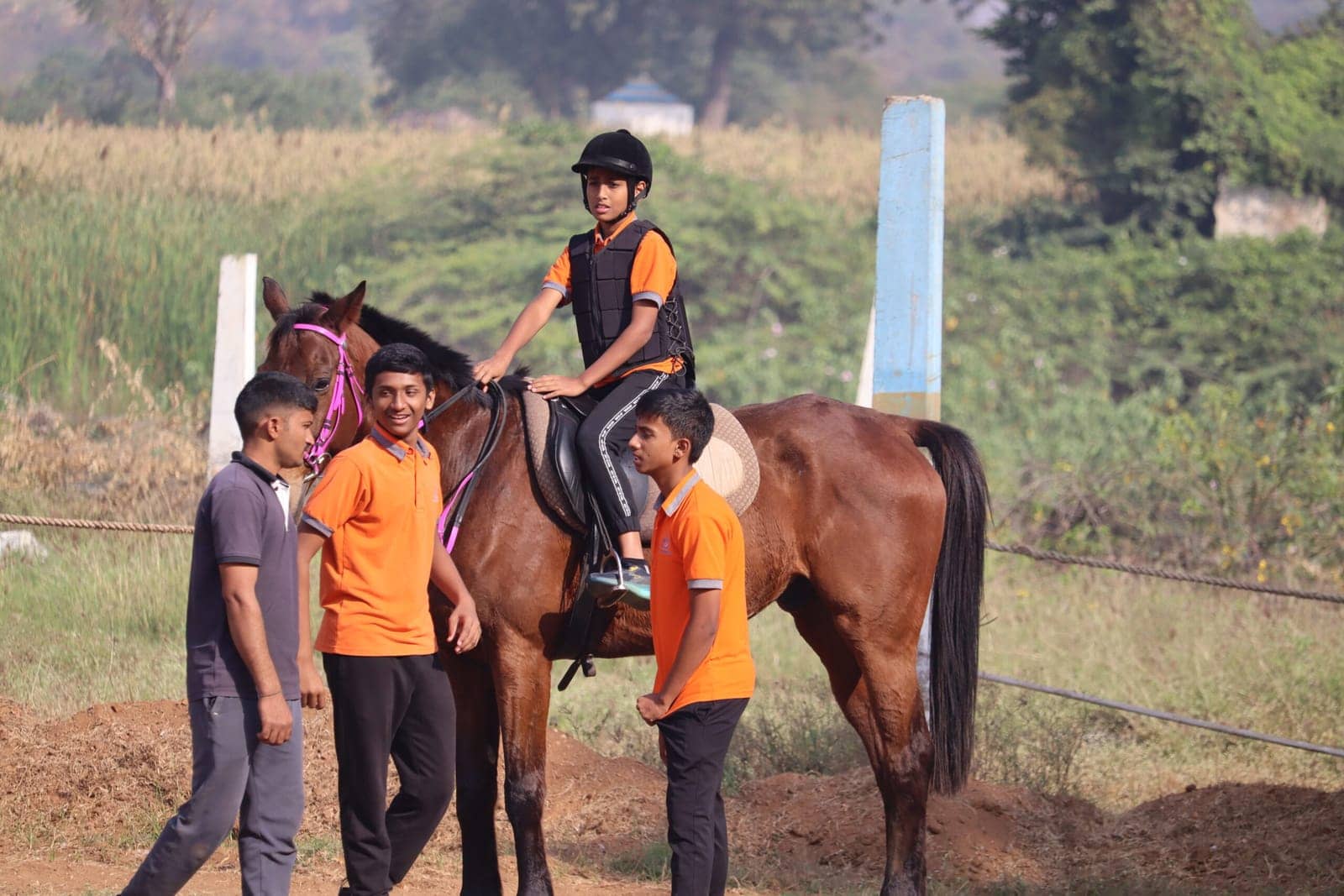 Students playing horse rider kid at Sri Sharada International School