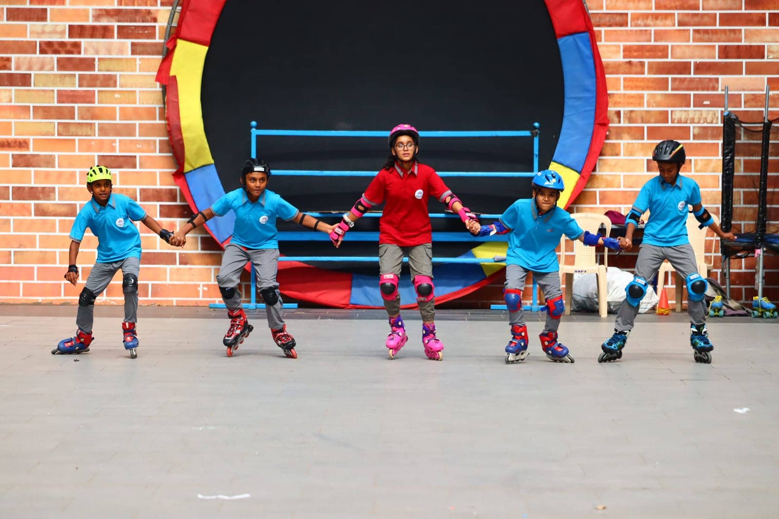 Students playing skating action at Sri Sharada International School